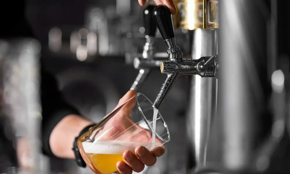Beer tap pouring beer